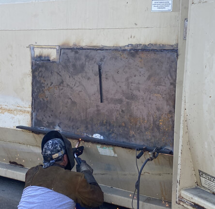 welding repair for trash compactor container